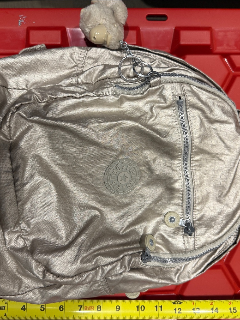 Kipling Metallic Cream Backpack with Plush Bear Charm